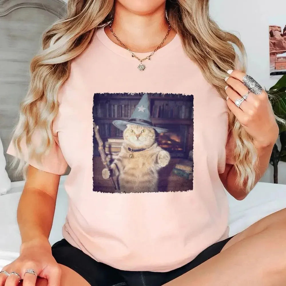 Blush pink cat wizard graphic T-shirt with a square chest print and crew neckline.