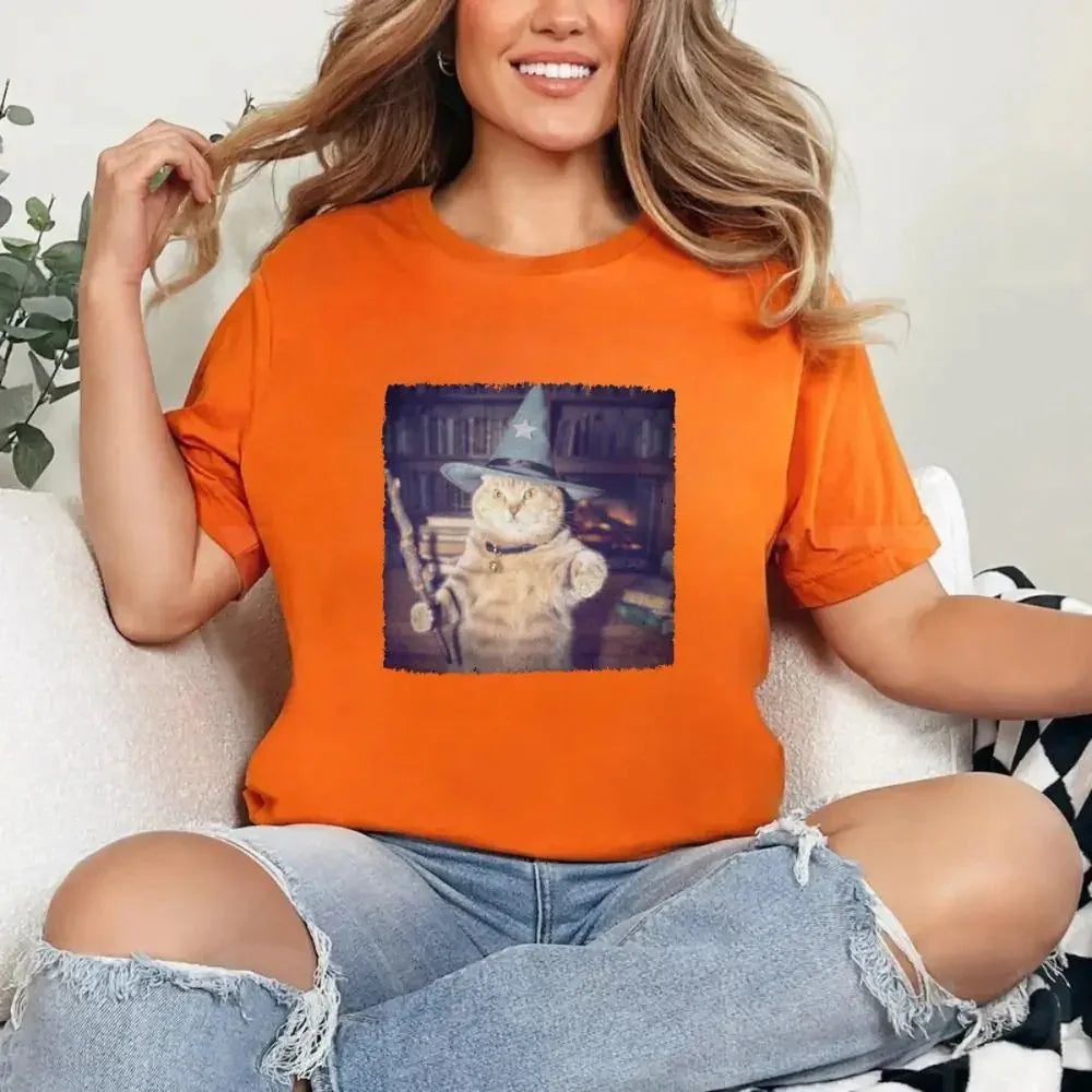 Orange Halloween cat wizard graphic T-shirt with a square illustrated print on front.