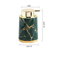 Green ceramic foam soap dispenser with gold pump top and marble vein pattern
