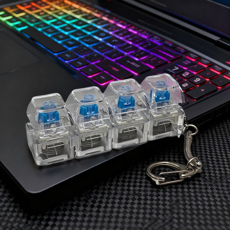 Glowing mini keyboard keycap keychain with clear caps and blue backlit key switches