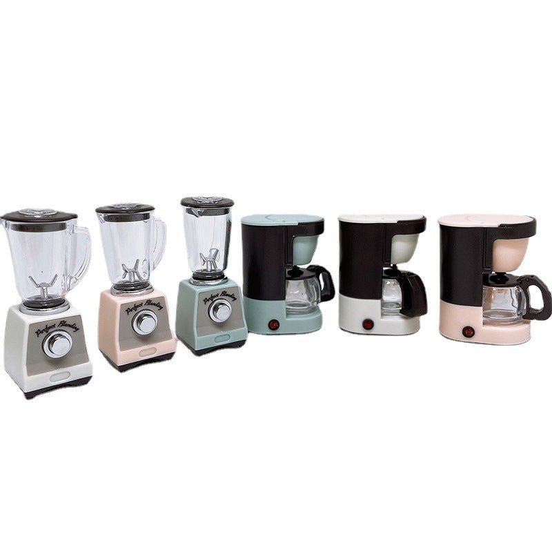Assorted-color toy blender set with clear jars, black lids, and circular front dials