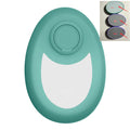 Crystal magic epilator in green, oval handheld with circular button and U-shaped opening