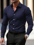 Men's long-sleeve casual button-down shirt in navy blue, button front, spread collar