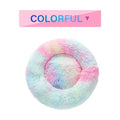 Donut-shaped plush pet bed in colorful pastel tones with a round center