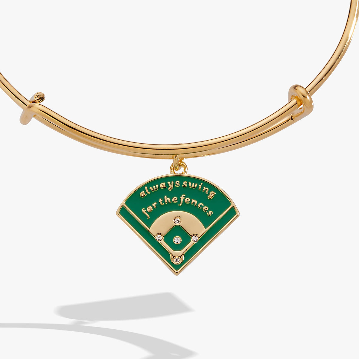 Gold charm bangle with green baseball diamond enamel center charm