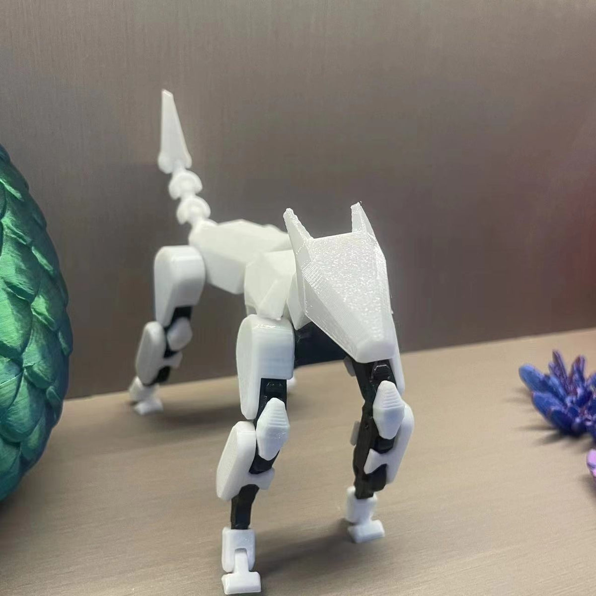 Multi-jointed robot dog action figure, white four-legged design