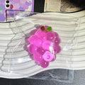 Purple transparent grape stress-relief toy in clear plastic pouch with zipper