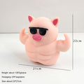 Large squishy pig toy with sunglasses and pink snout, size shown 21 x 23 cm