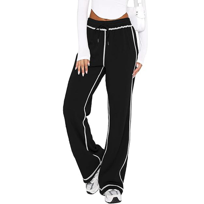 Black jogger sweatpants with drawstring, elastic waist, and white side stripe