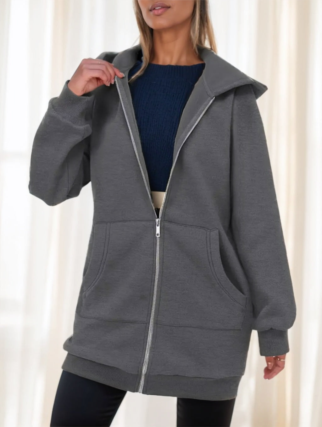 Women's grey long zip-up hoodie with hood, kangaroo pocket, and front zipper