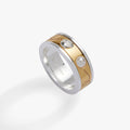 Two-tone baseball fidget ring with baseball emblem, pearl accent, and perforated detailing