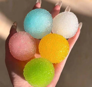 Squishy stress relief toy set of 5 textured balls: teal, white, pink, yellow, green