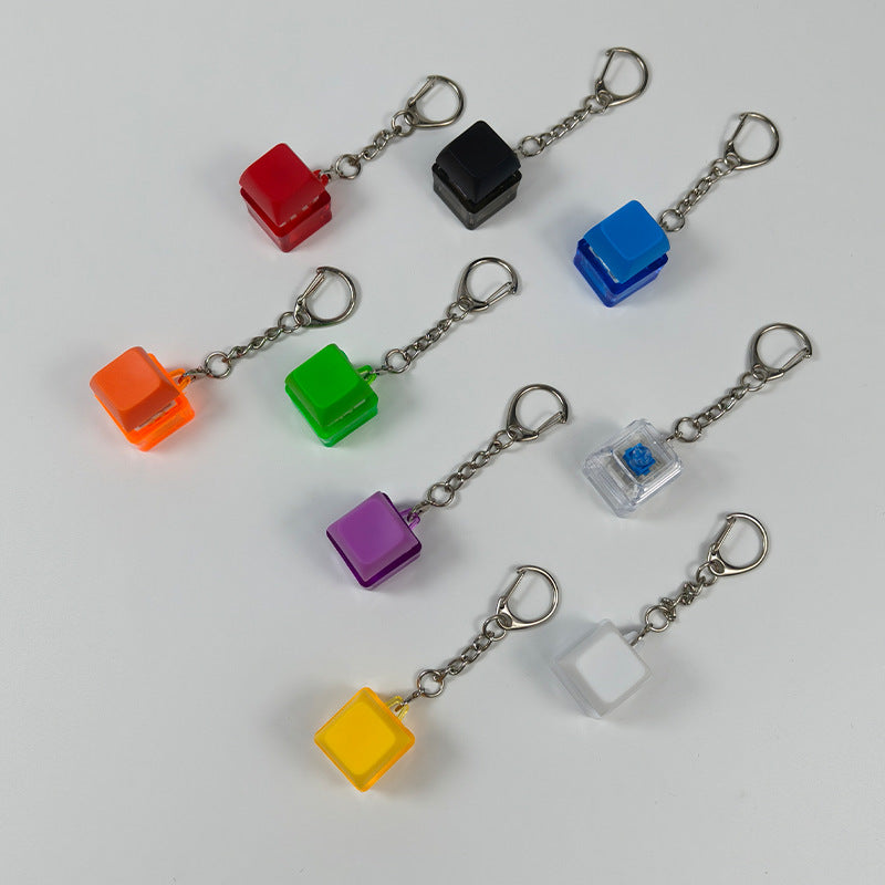 Cube stress-relief keychain toy with finger-popping buttons, multi-color set
