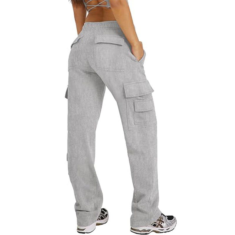 Light gray wide-leg cargo pants with flap cargo pockets and side pocket details