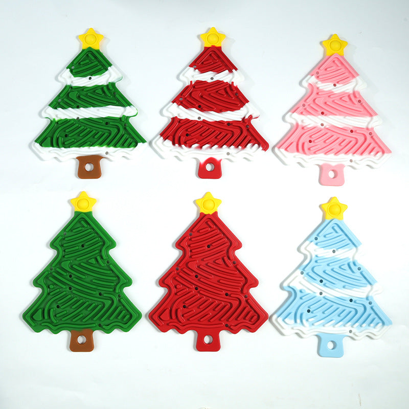 Assorted Christmas tree sensory boards in red, green, pink, and blue with grooved line patterns