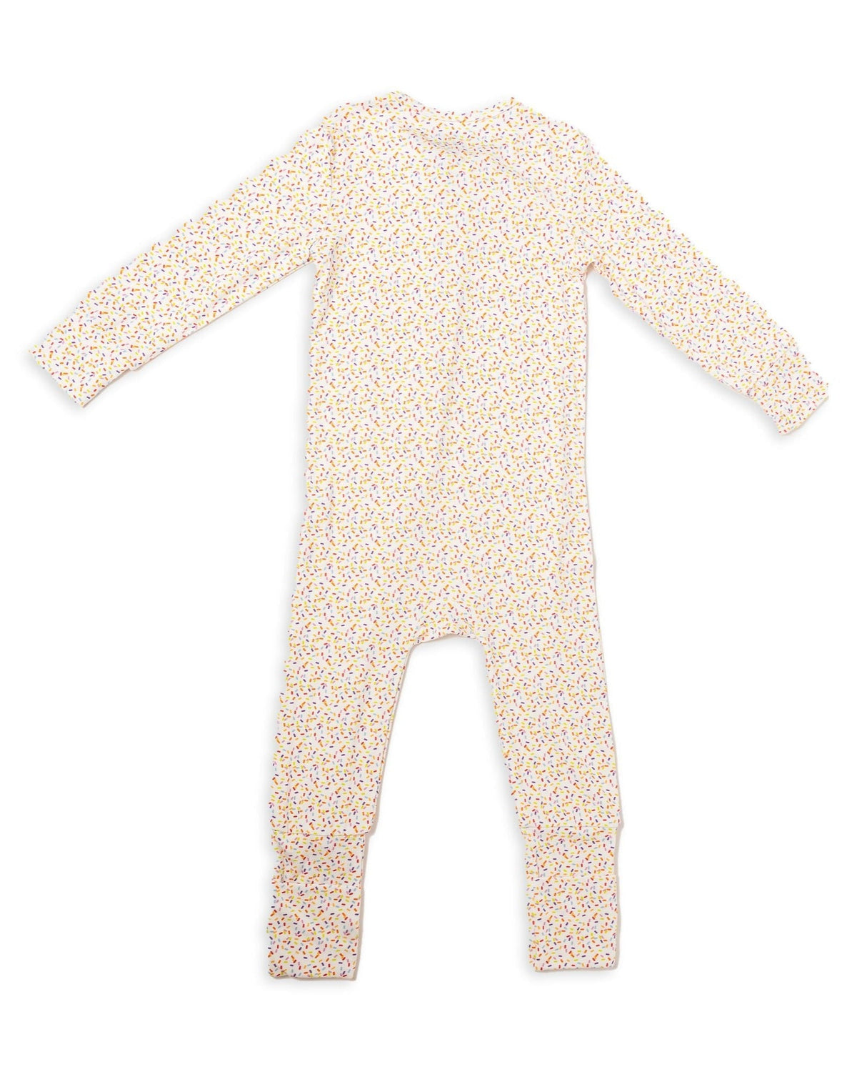 White confetti-sprinkle toddler pajama romper, long sleeves and footed legs