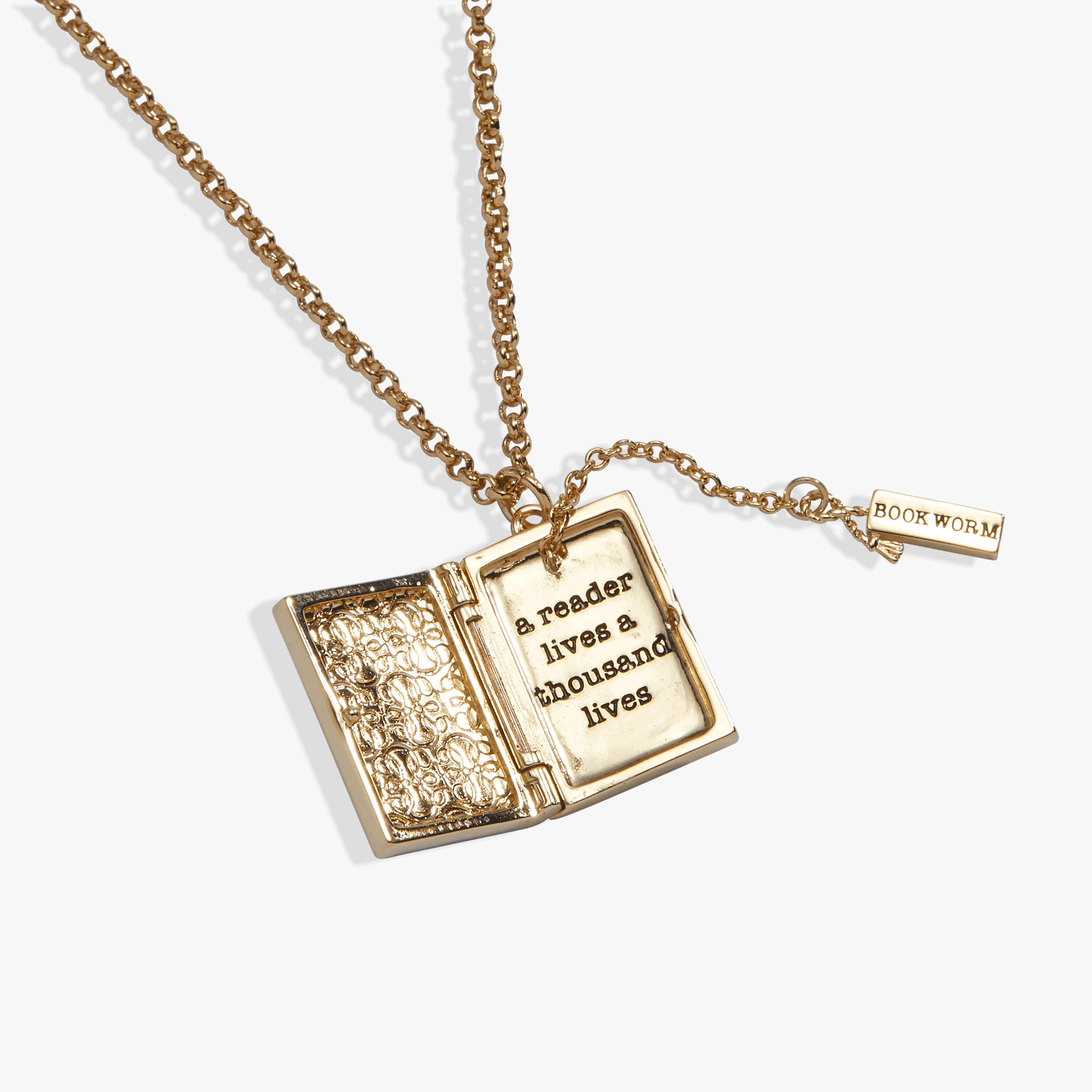 Gold open-book locket pendant with “a reader lives a thousand lives” text