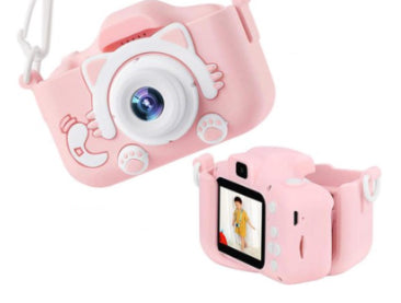 Pink kids' digital camera toy with round lens and wrist strap, shown with front and side views