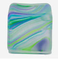Square marbled ice-cube squeeze toy in light blue with green and purple stripe swirls