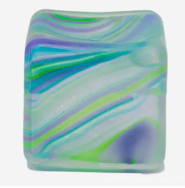 Square marbled ice-cube squeeze toy in light blue with green and purple stripe swirls