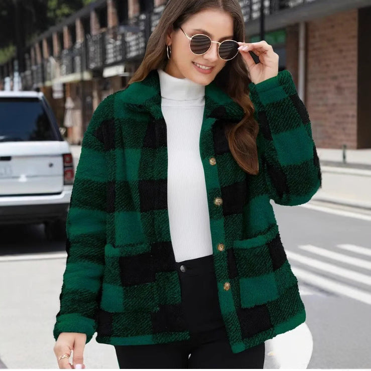 Women’s green and black plaid single-breasted jacket with button front and lapel collar.