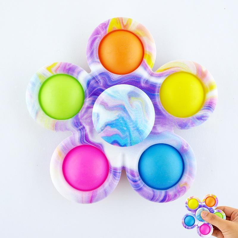 Pastel purple tie-dye fidget spinner with six colorful button tips and blue center disc.