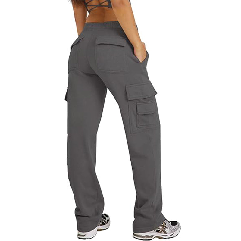 Dark gray cargo pants with loose wide-leg fit and stacked flap side pockets