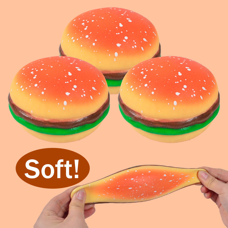 Burger squishy stress relief ball with orange bun, green lettuce, and brown patty