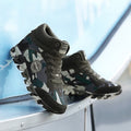 High-top camouflage lace-up sneakers with black laces and Sport logo patch