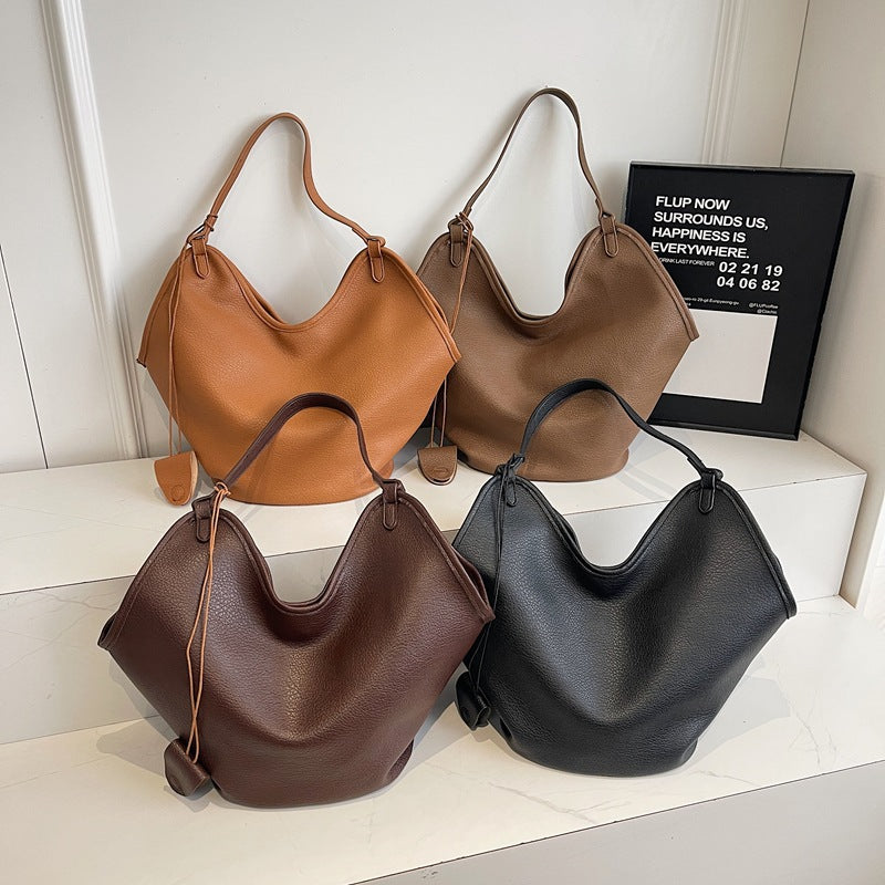 Women’s PU bucket tote bags, lychee-grain texture, dual shoulder straps, multiple colors shown