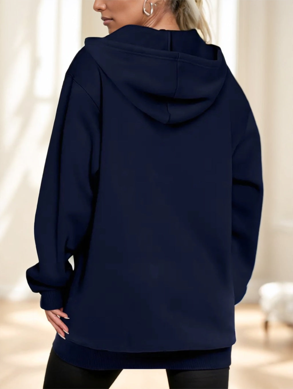 Women's navy long zip-up hoodie, back view with hood and relaxed fit