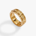Gold-tone chess fidget ring with engraved band and small clear stone accents