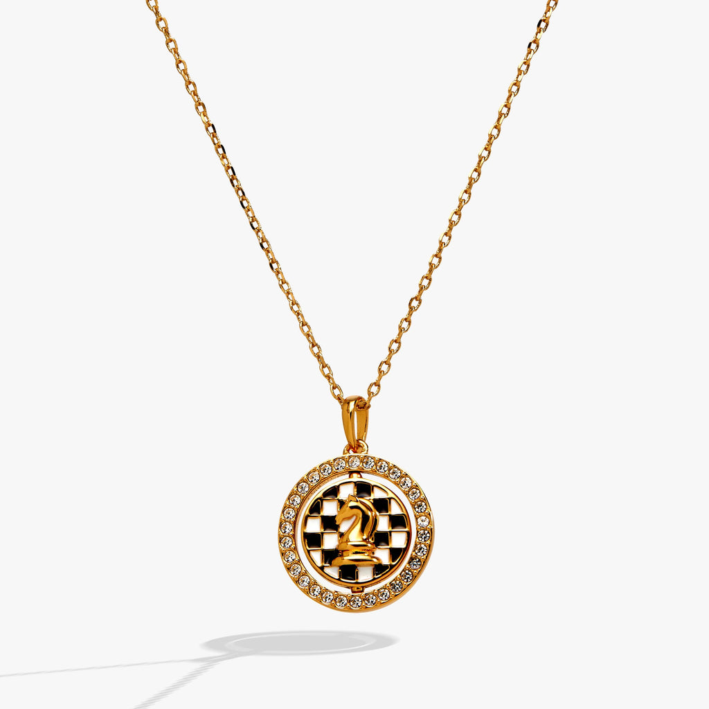 Gold chess spinner pendant necklace with crystal halo
