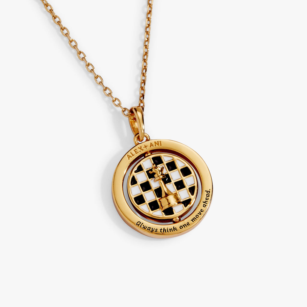 Gold round chess spinner pendant with engraved rim text and crystal halo