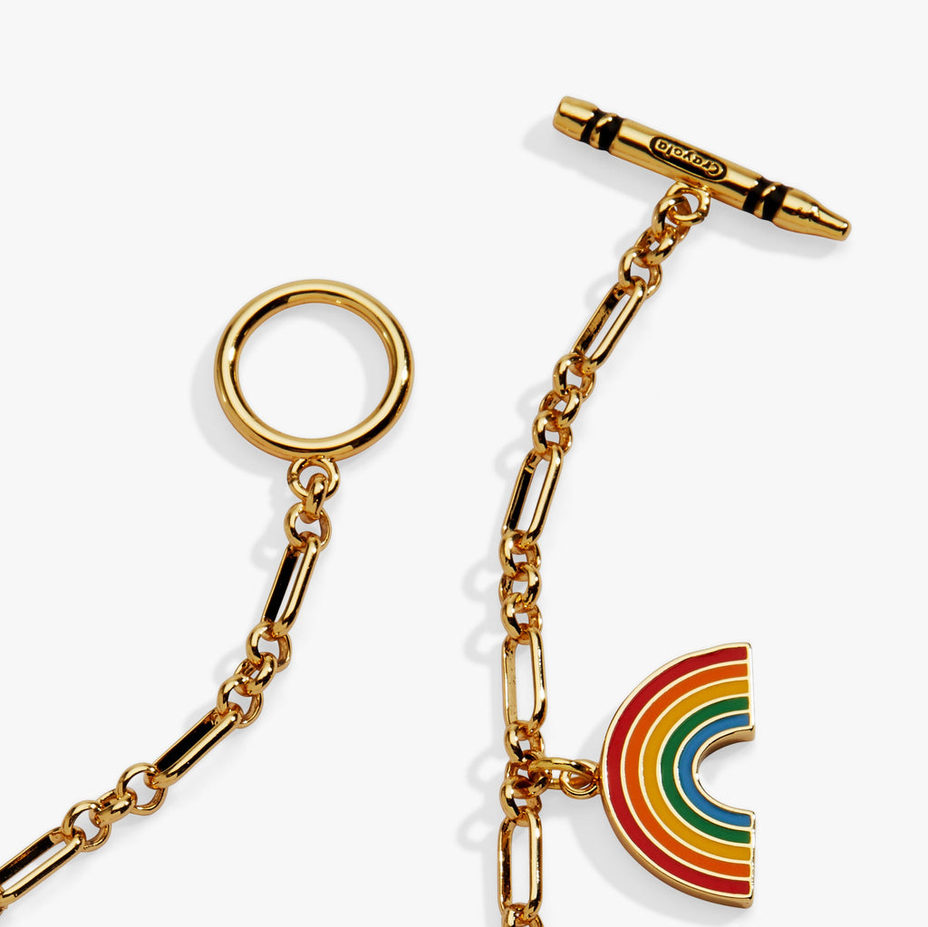Gold chain bracelet with rainbow enamel charm and gold ring clasp