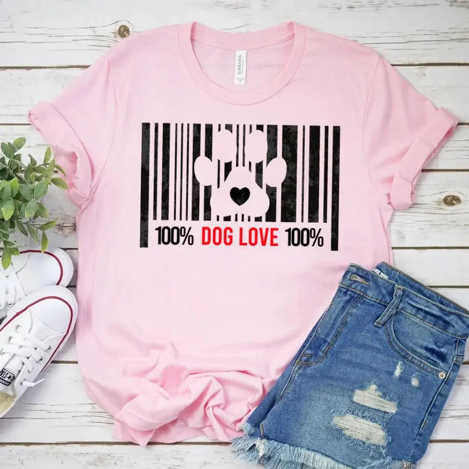 Light pink T-shirt with black barcode dog paw heart graphic and “100% DOG LOVE 100%”
