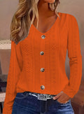 Women's long-sleeve V-neck blouse, orange button-front with dotted eyelet pattern
