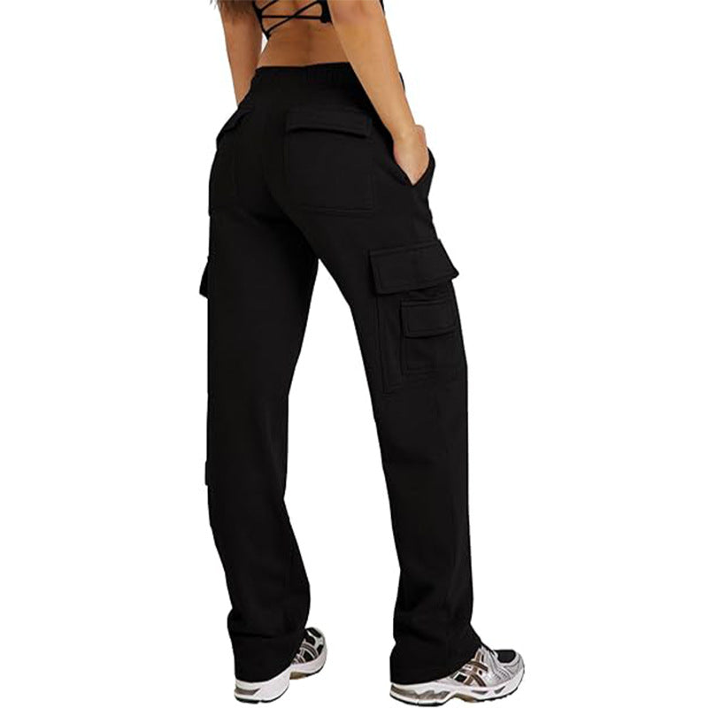 Black cargo pants with loose wide-leg fit and flap cargo pockets at the thighs