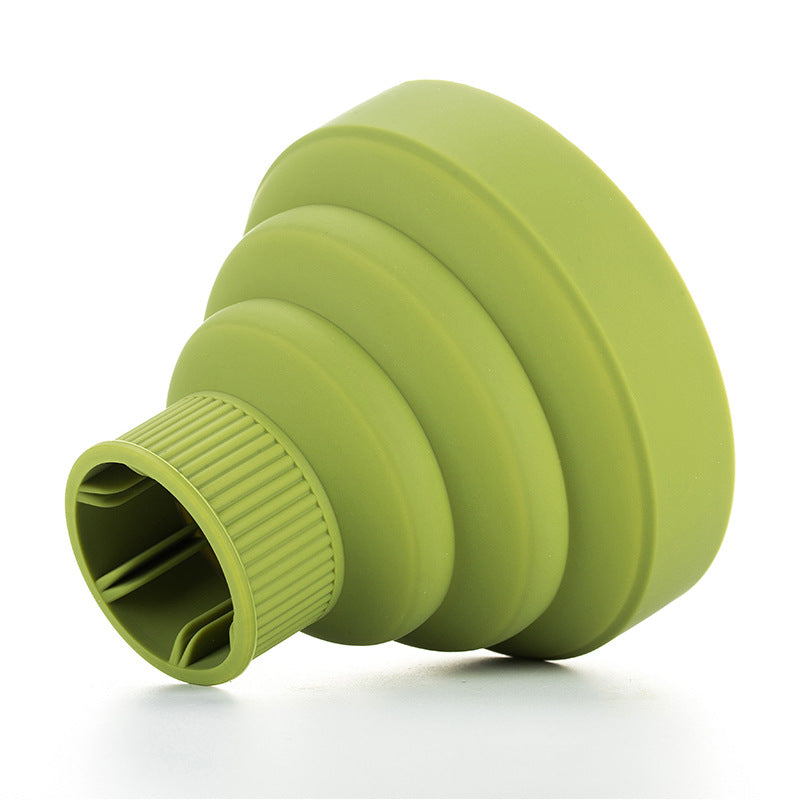 Green silicone folding hair diffuser with ribbed base and circular black mesh
