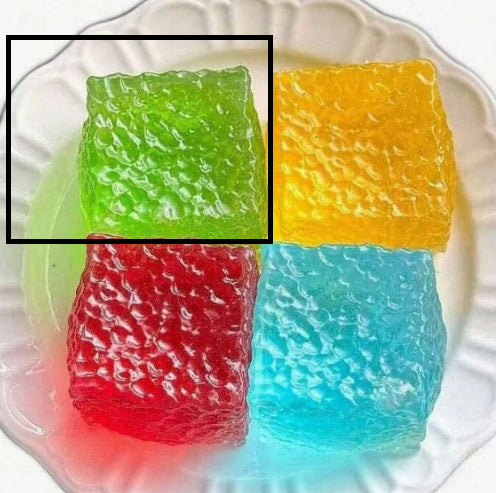 Green and yellow translucent squishy cubes highlighted; red and blue cubes below.
