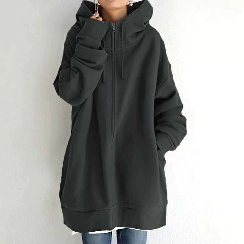 Women’s oversized black zip-up hooded coat with long sleeves and front zipper