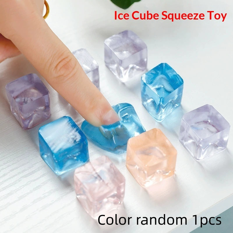 Translucent TPU squeeze toy ice cubes in blue, purple, and peach, with hand