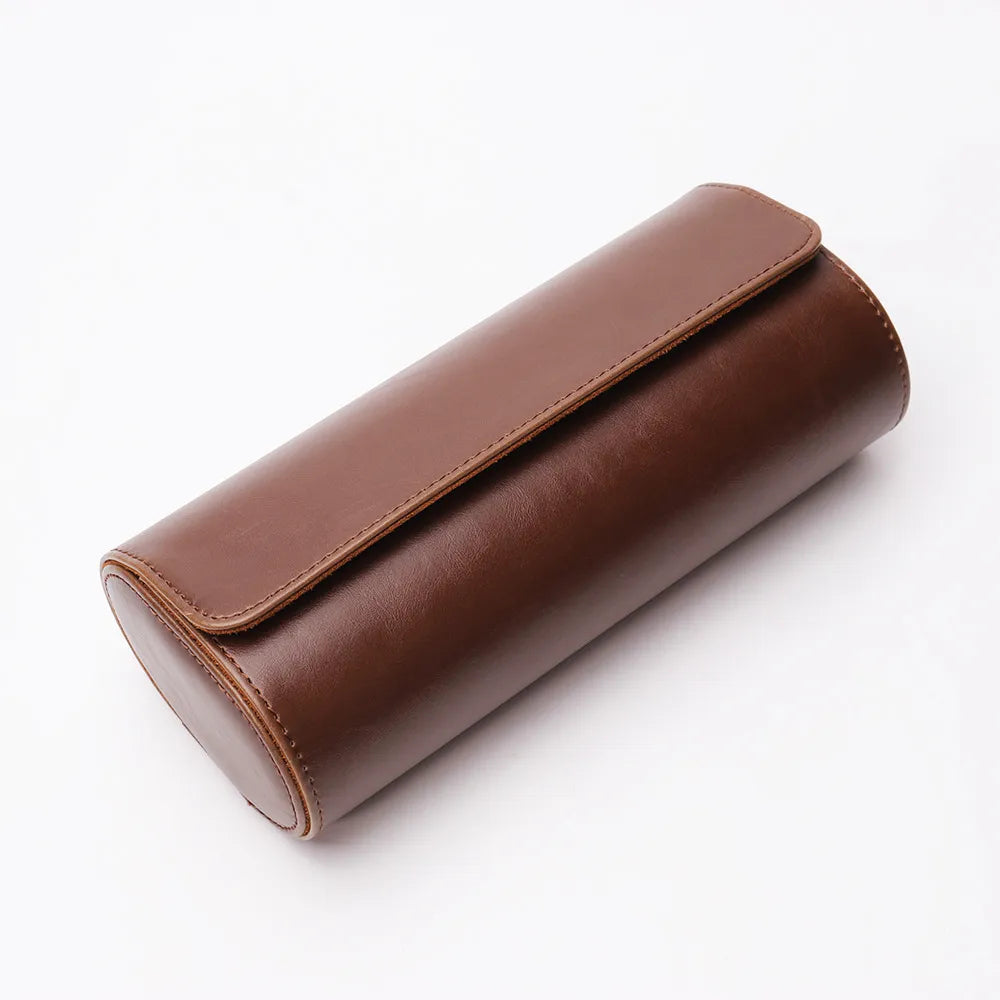 Three-slot travel watch case with smooth dark brown exterior and stitched top flap