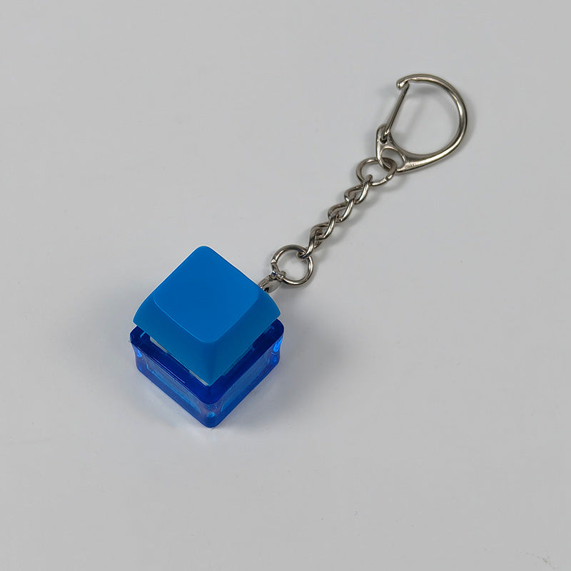Blue square finger-popping stress-relief keychain toy with metal chain and rings