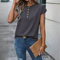 Gray raglan sleeve top with button-front placket and relaxed fit