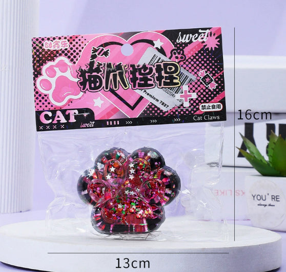 Red glitter cat paw stress toy in clear blister pack