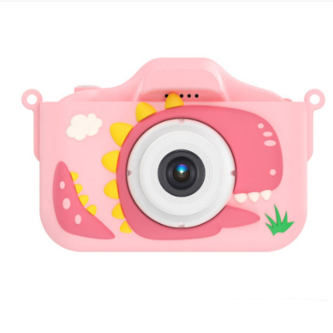 Pink kids' digital camera toy with dinosaur horn decoration, round lens, and green grass graphic