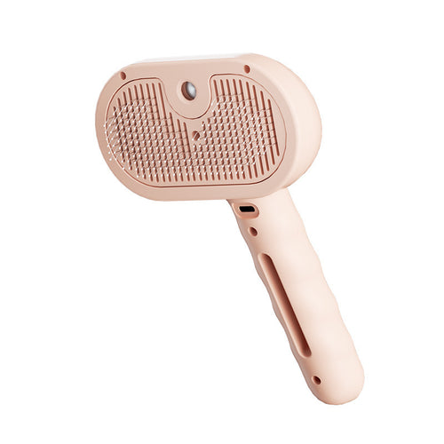 Pink pet steam brush with silicone bristle pad and steam head