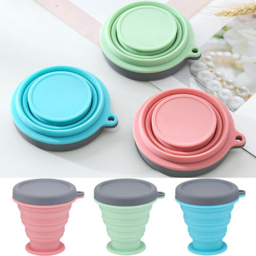 Collapsible silicone travel coffee cup trio in teal, mint green, and coral with gray lids