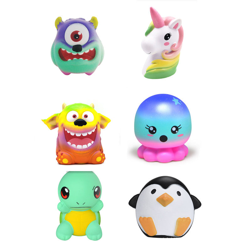 Assorted cute plush animal toys set: monster, unicorn, smiley critters, penguin.